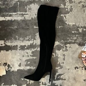 Thigh high heeled boots